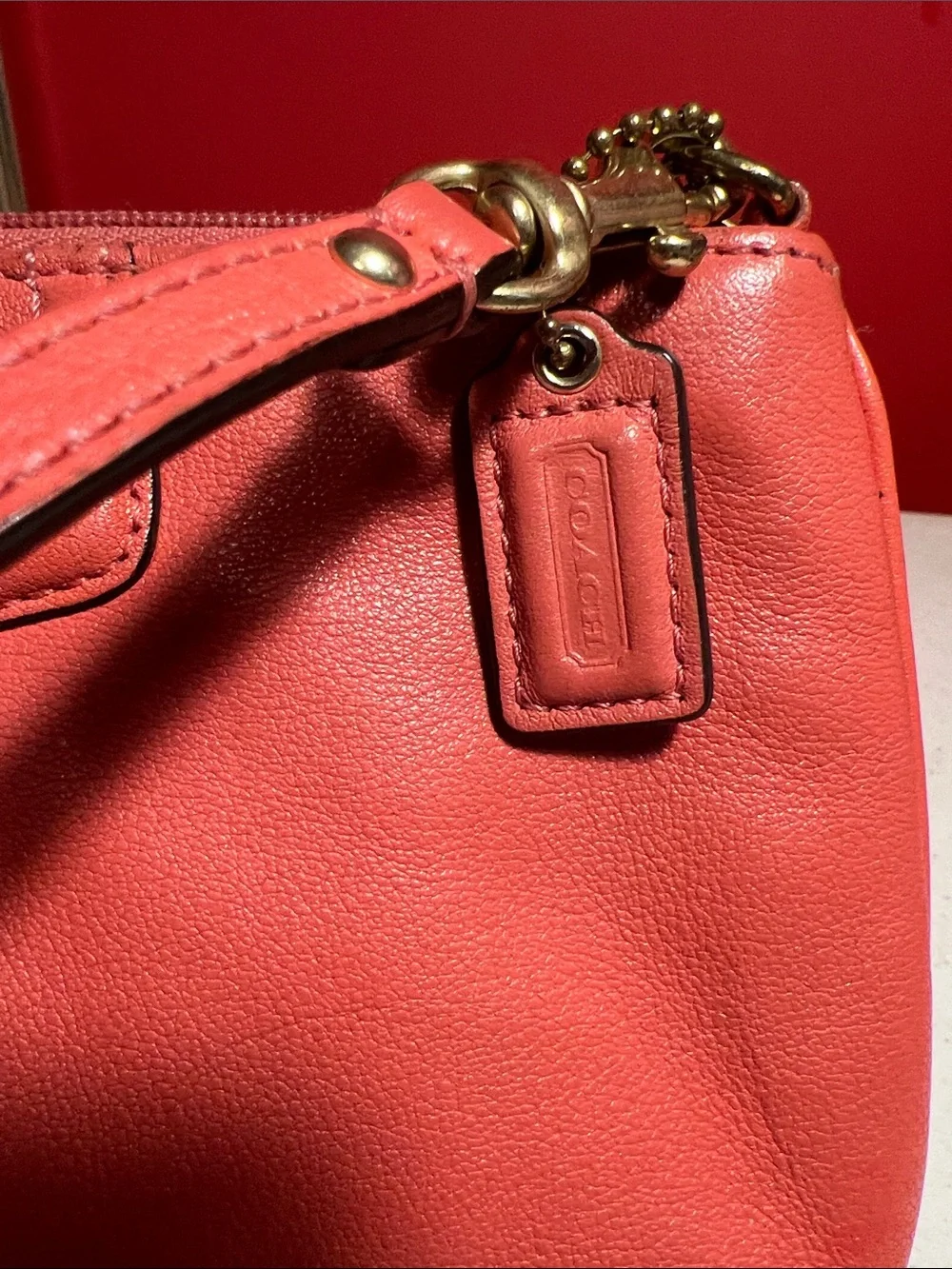 Coach Coral Orange Leather Wristlet with Gold Hardware